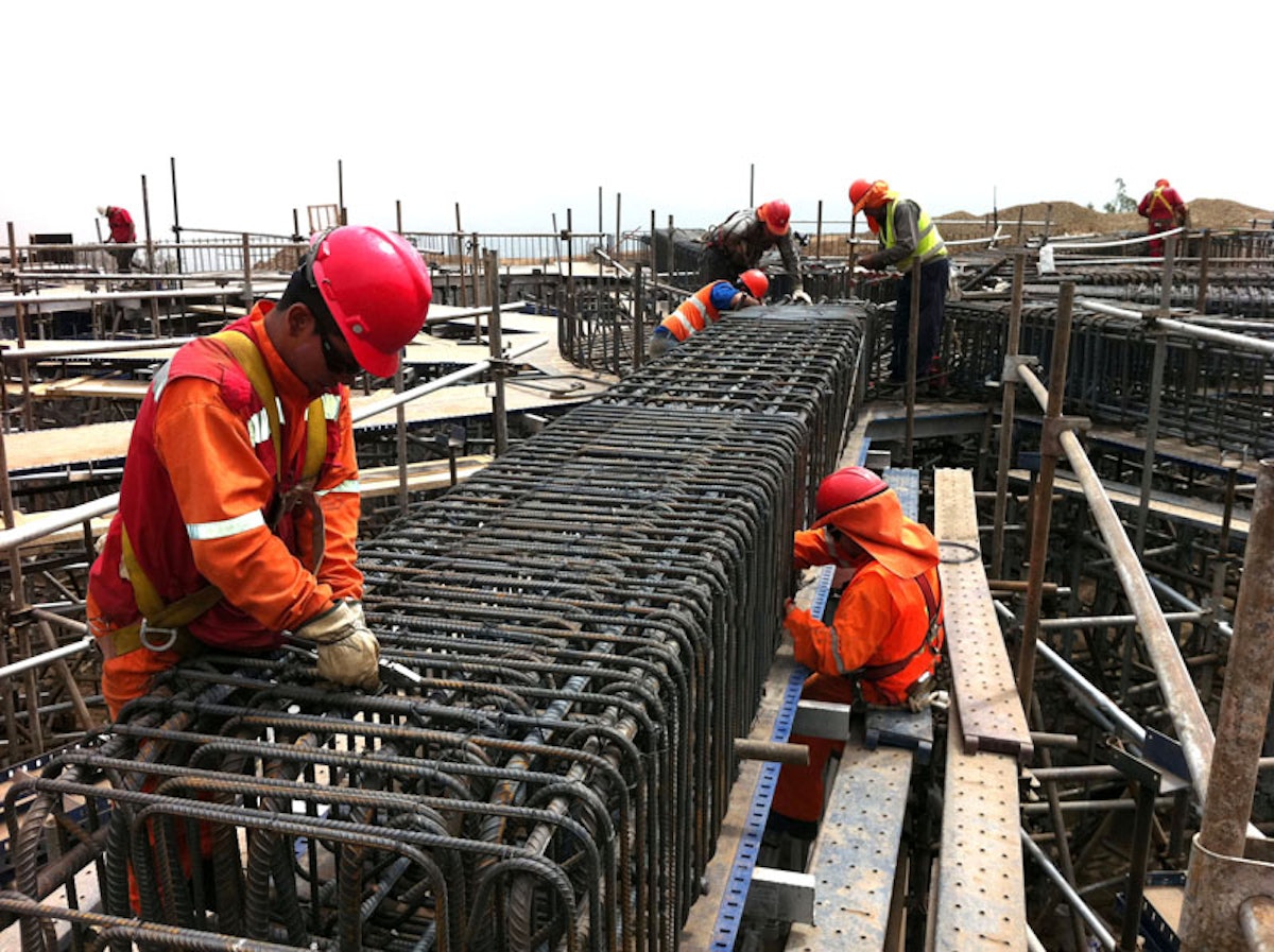 Workers carry forward construction on the House of Worship for the South American continent in this photo from March 2013.