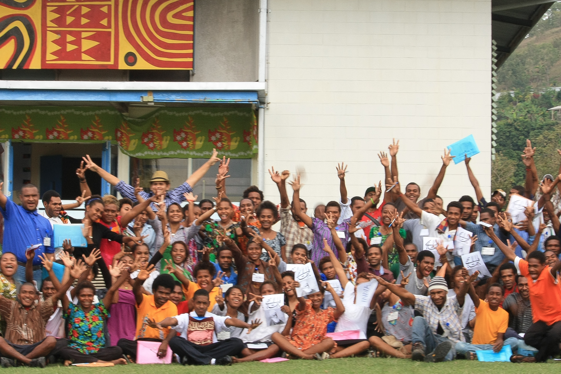 Participants gather outside of the conference venue in Port Moresby, Papua New Guinea.