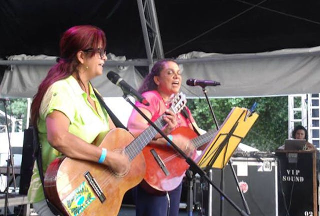 Two Baha'is perform at an event initiated by the Commission on Combating Religious Intolerance in Brazil. The gathering on 21 January provided an opportunity for representatives of each religion in the commission to share a greeting and musical performance.