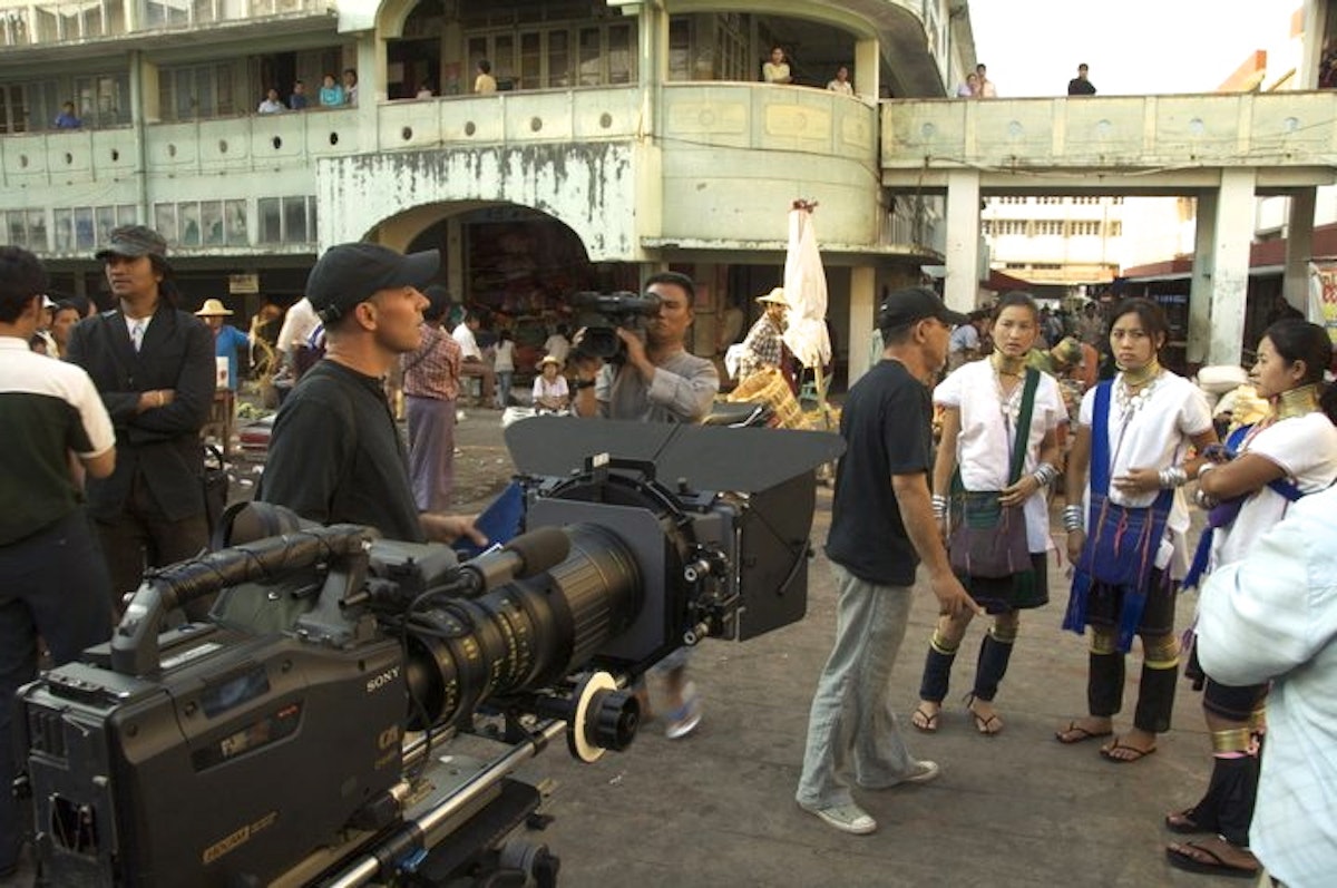 Director Aung Ko Latt discusses a scene with his actors during the filming of Kayan Beauties, a feature film that has brought the Kayan culture to a wide audience for the first time.