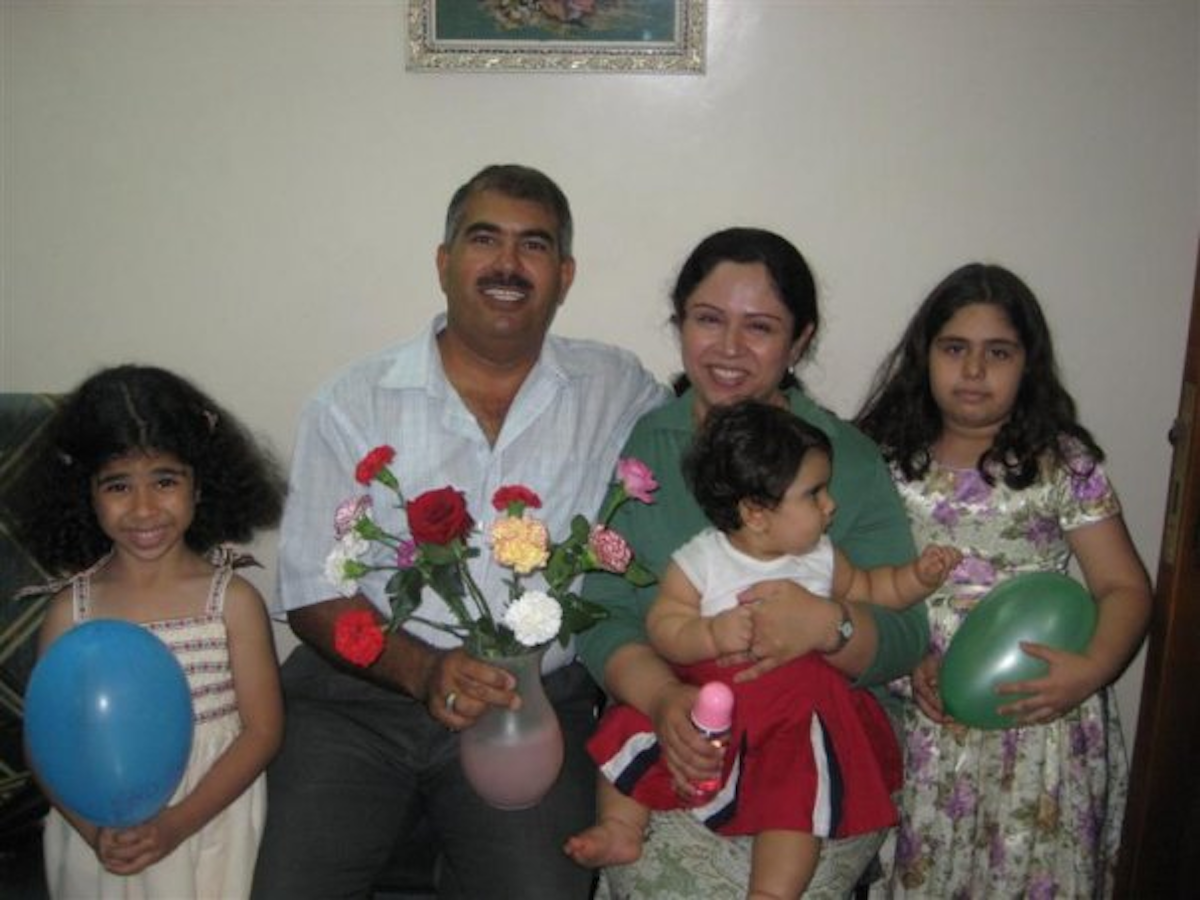 Hamed Kamal bin Haydara with his family, before his imprisonment.