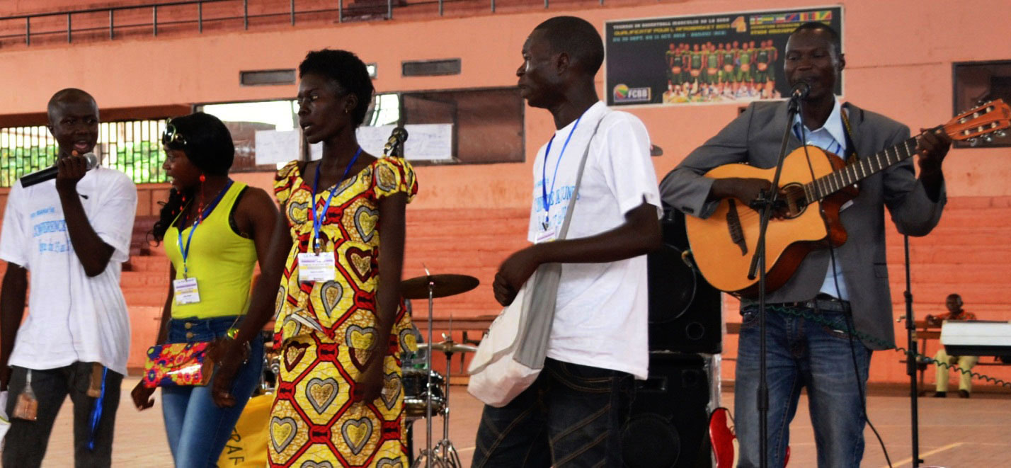 The arts played a significant role in the conference. These youth prepared a musical piece to convey aspects of what they were learning together.