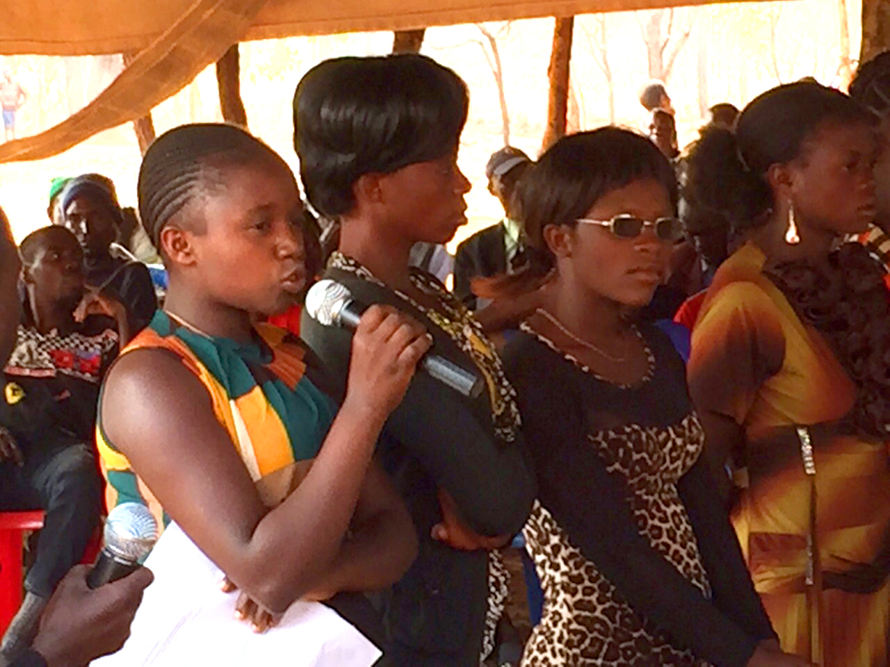 Young women share insights from their group discussion on the equality of men and women