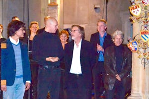 Professor Lasse Thoresen, pictured centre, talks with fellow composers from Europe, at St. Giles' Cripplegate church, London, following a performance by the BBC Singers, 30 September 2015.