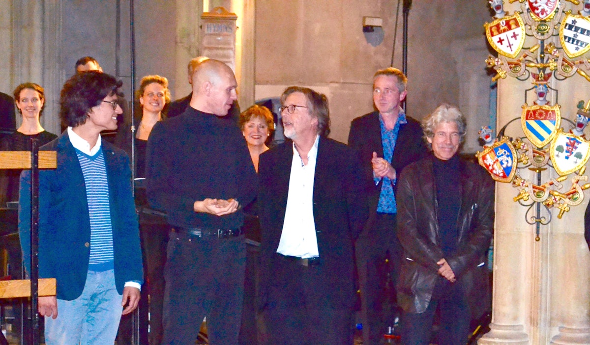 Professor Lasse Thoresen, pictured centre, talks with fellow composers from Europe, at St. Giles' Cripplegate church, London, following a performance by the BBC Singers, 30 September 2015.