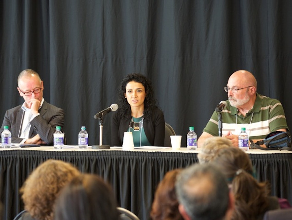 Panelists discuss the Iranian Baha’i refugee movement. From left to right: Mark Davidson, Director-General, Citizenship and Immigration Canada; Afsoon Houshidari, a member of the Canadian Baha’i Community who was among the Baha’is in the refugee program; and Dennis Scown, former Immigration Program Manager, Citizenship and Immigration Canada. (Photo by Emad Talisman)