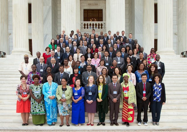 Members of the Continental Boards of Counsellors pictured here with members of the Universal House of Justice and the International Teaching Centre