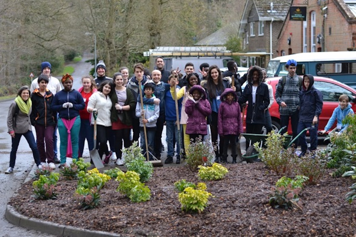 Youth accompanying junior youth on a service project at a gathering in the United Kingdom in April 2016.