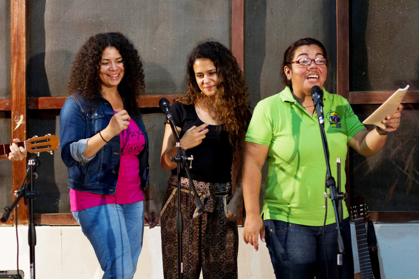 Participants practice performing songs composed at the workshop.