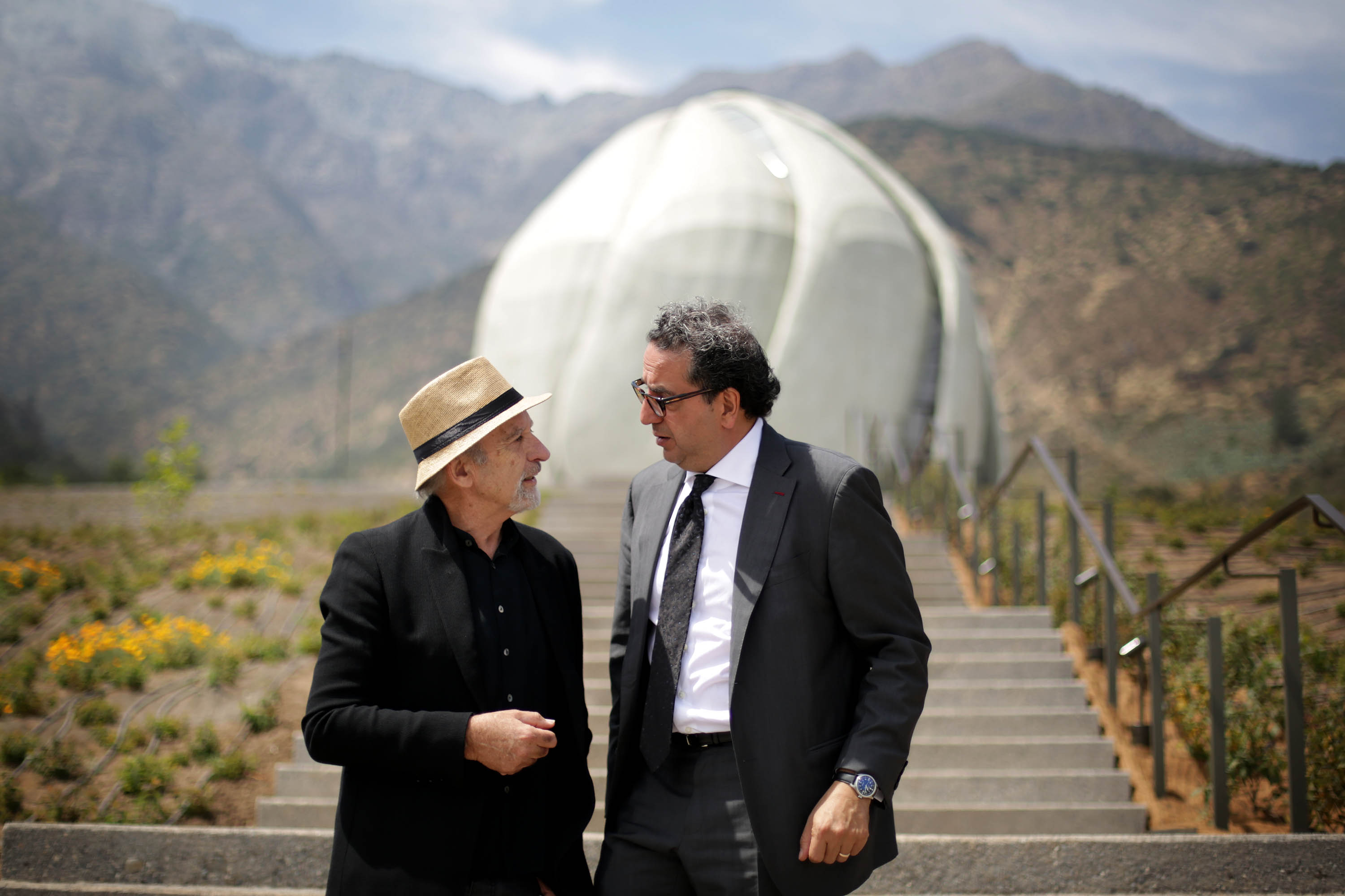 The architect of the Baha’i House of Worship, Siamak Hariri (right), speaks to Juan Grimm, the landscape architect for the Temple grounds.
