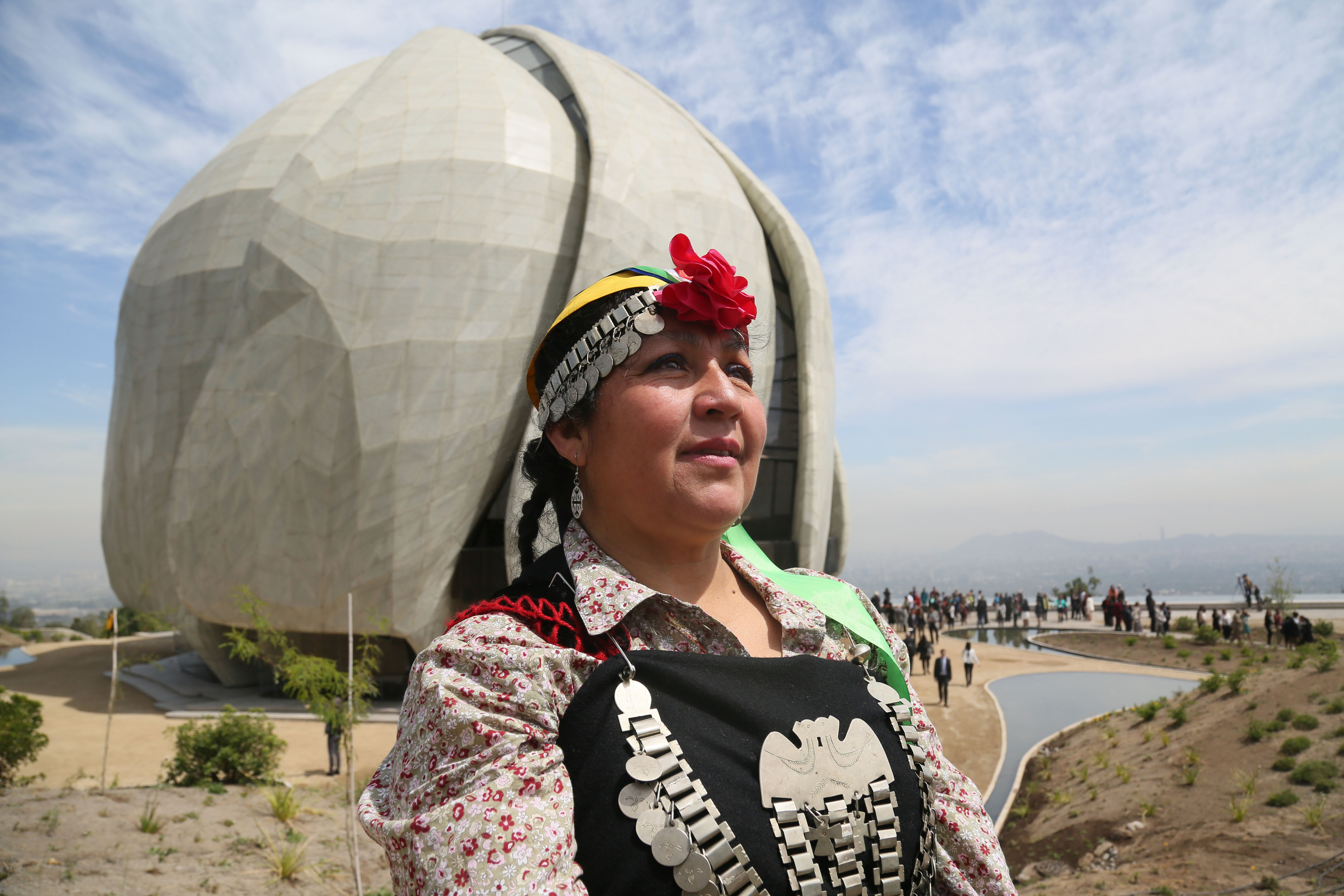 A member of the indigenous Mapuche people of Chile, stands outside the House of Worship. (See Editor's note.)