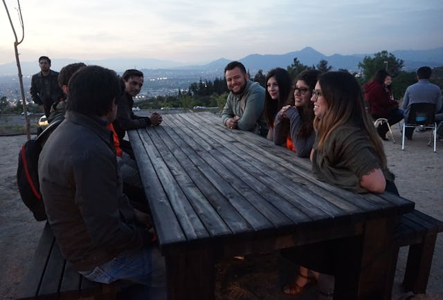 Participants in a discussion group on the Temple grounds in Santiago, Chile.