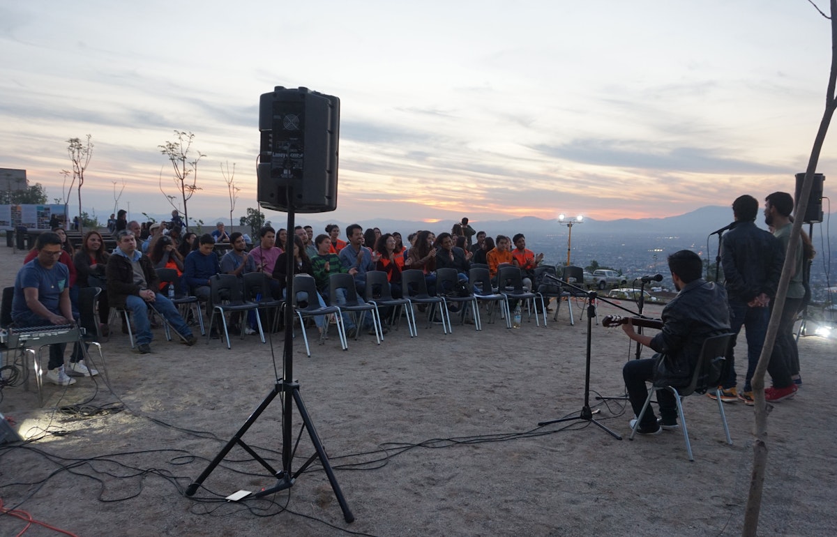 A musical presentation at a discussion group on the Temple grounds in Santiago, Chile.