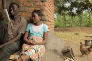 Mercy, played by Hazel Roberts, and her brother, Blessings, played by Allick Chavula, study together. A still shot from the film *Mercy’s Blessing*.