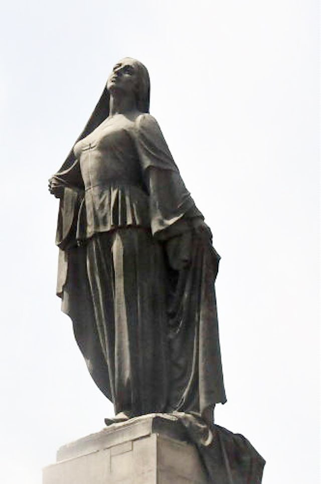 The statue of a liberated woman that stands in central Baku depicts a woman casting off her veil and is said to have been influenced by the story of Tahirih.