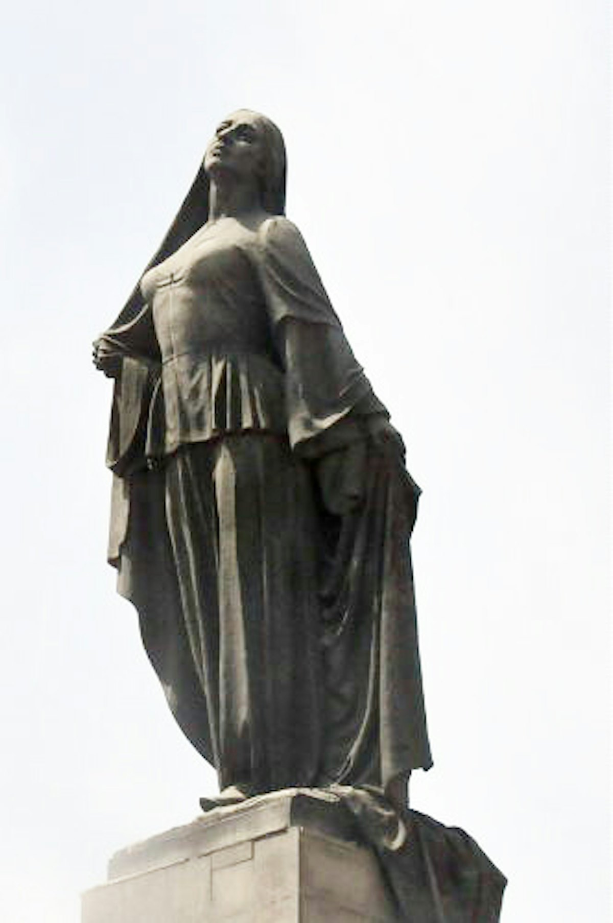 The statue of a liberated woman that stands in central Baku depicts a woman casting off her veil and is said to have been influenced by the story of Tahirih.