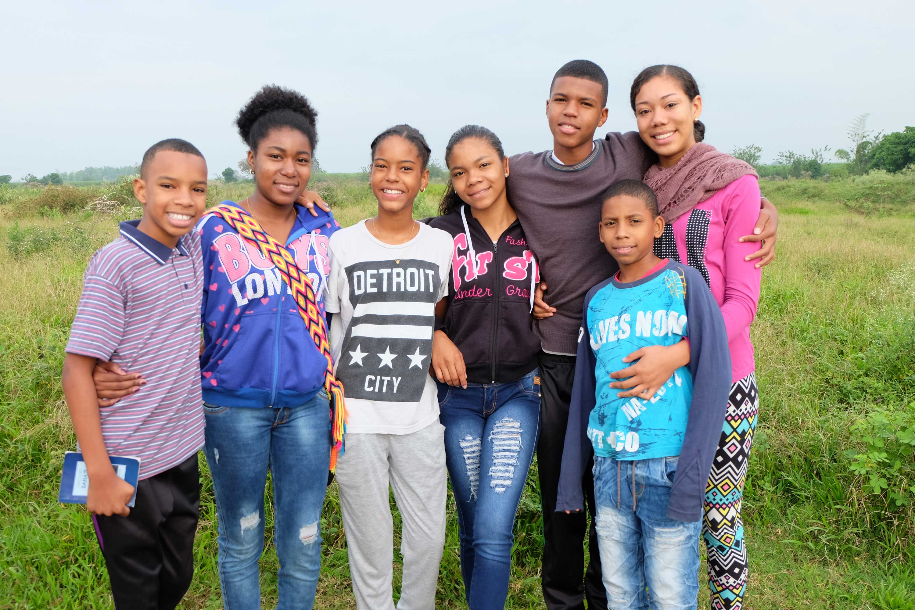 Youth and junior youth gather on the Bosque Nativo site, adjacent to the Temple property, for a regular community devotional held to pray for the progress of the construction project.