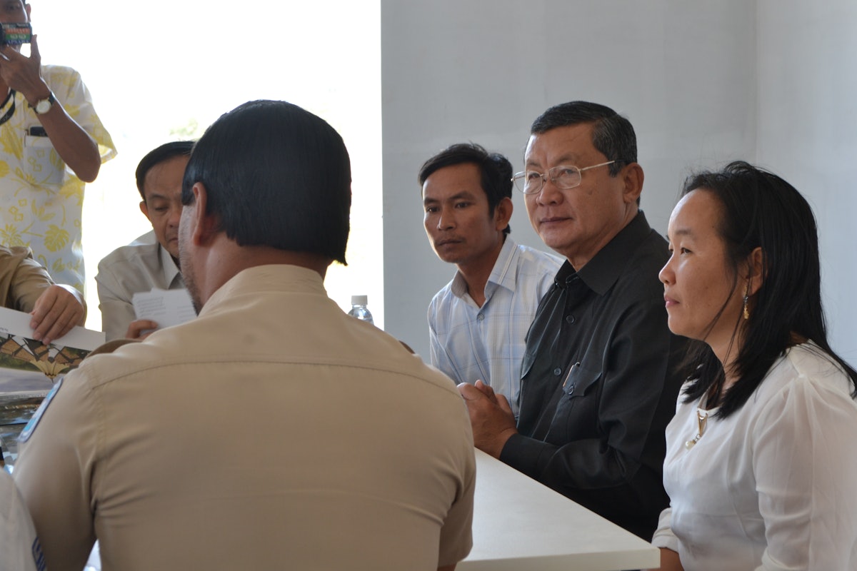 H.E. Chan Sophal, Provincial governor of Battambang, meeting with the project team for the local Baha'i Temple.
