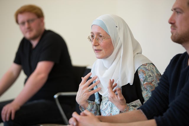 Participants consult in small groups at the "Further thoughts on Religious Pluralism" conference.