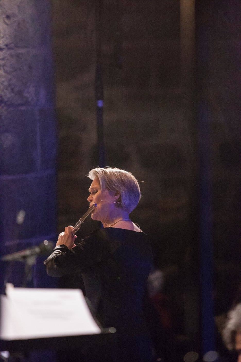 Flutist Maiken Mathisen Schau performs Prison Poems, the composition by Lasse Thoresen inspired by Mahvash Sabet's book of poetry, which features an intricate solo flute melody meant to represent the emotional content of the material.