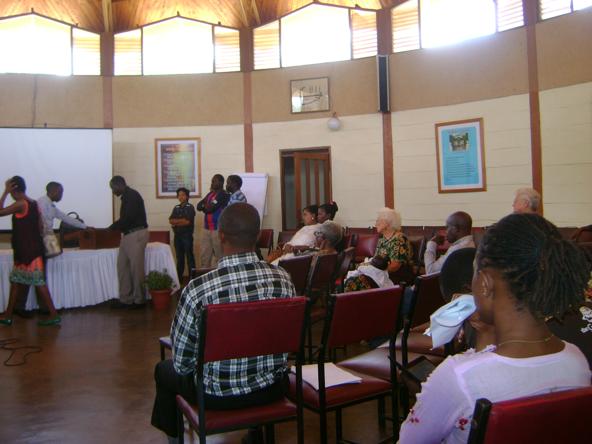 Delegates at the Baha'i National Convention in Uganda vote for their National Spiritual Assembly. Baha'i elections are distinct for their lack of nomination and campaigning.