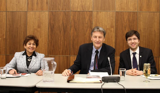 Yasmin Ratansi (left), the first female Muslim Member of Parliament, sits with MPs John McKay (middle) and Garnett Genuis (right) at the conference in Ottawa on the role of religion in Canadian society.
