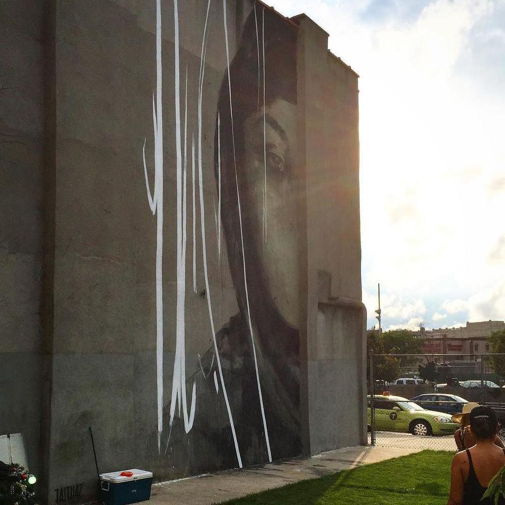 This mural by South African artist Faith47 is a portrait of Atena Farghadani, an Iranian artist and activist, who was sentenced to 12 years in prison in 2015. Farghadani is shown with no mouth, to symbolize how her voice, and that of countless others in Iran, has been silenced. Although created as a gesture of international solidarity, the mural caused a divisive debate in the neighborhood in which it was painted. The mural was vandalized and eventually painted over.