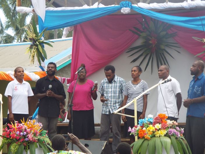 Youth singers from the Adventist Church performed at the ceremony on 18 June.