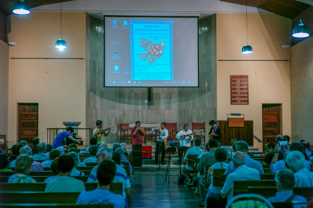Performers at the conference on refugees
