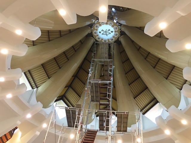 The sacred symbol, representing the connection between God, His Manifestations, and mankind, was raised to the apex of the dome in the House of Worship in Battambang, Cambodia, on 20 August 2017.