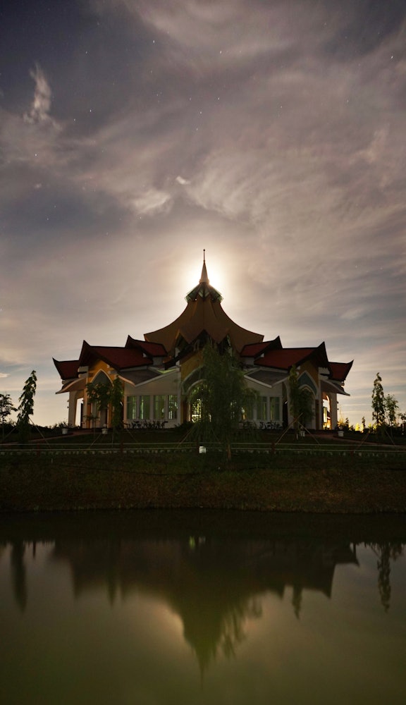 "The emergence of a House of Worship in Battambang," wrote the Universal House of Justice, "is a testament to how brightly the light of faith shines in the hearts of the friends there. Its design, the work of an accomplished Cambodian architect, reflects the grace and beauty of that nation's culture; it uses innovative techniques but blends them with forms traditional to the region; it unquestionably belongs to the land from which it has risen... It is an edifice of noble purpose, erected by a people of noble spirit."