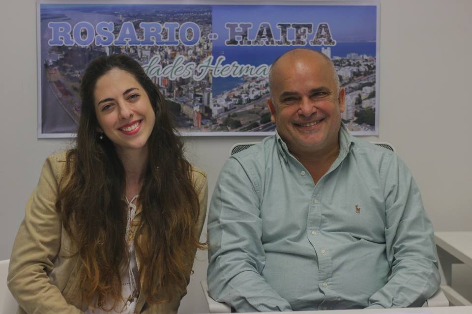 In Rosario, Argentina, Councilman Carlos Comi (right) and representative of the Baha'i community Bracha Sela (left) called a representative at the Baha'i World Centre on 2 August to convey greetings and goodwill in this special bicentenary year.