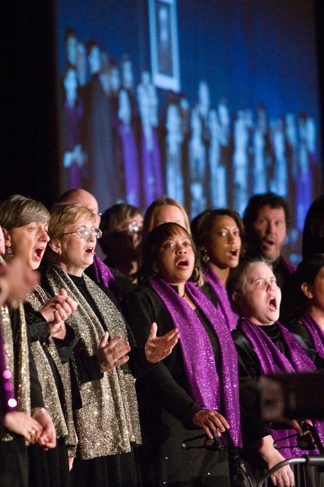 The site captures the diversity of the worldwide Baha’i community and breadth of its activities.  This photo comes from Chicago, United States. The Baha’i House of Worship Choir performs at one of 41 Regional Conferences held around the world called by the Universal House of Justice, 6 December 2008.