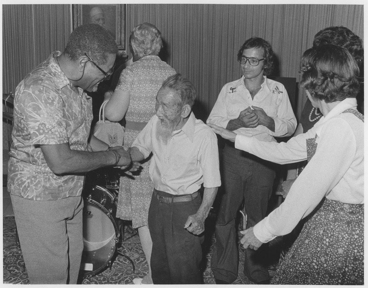 Dizzy Gillespie greets Saichiro Fujita, a prominent figure in Baha’i history and one of the first Japanese Baha’is. This photograph was taken at the Baha’i World Centre in 1975. Gillespie performed a concert during his visit to Haifa that year.