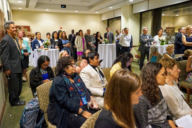 Participants at the reception in the BIC United Nations Office, New York, for the commemoration of the bicentenary of the birth of Baha’u’llah
