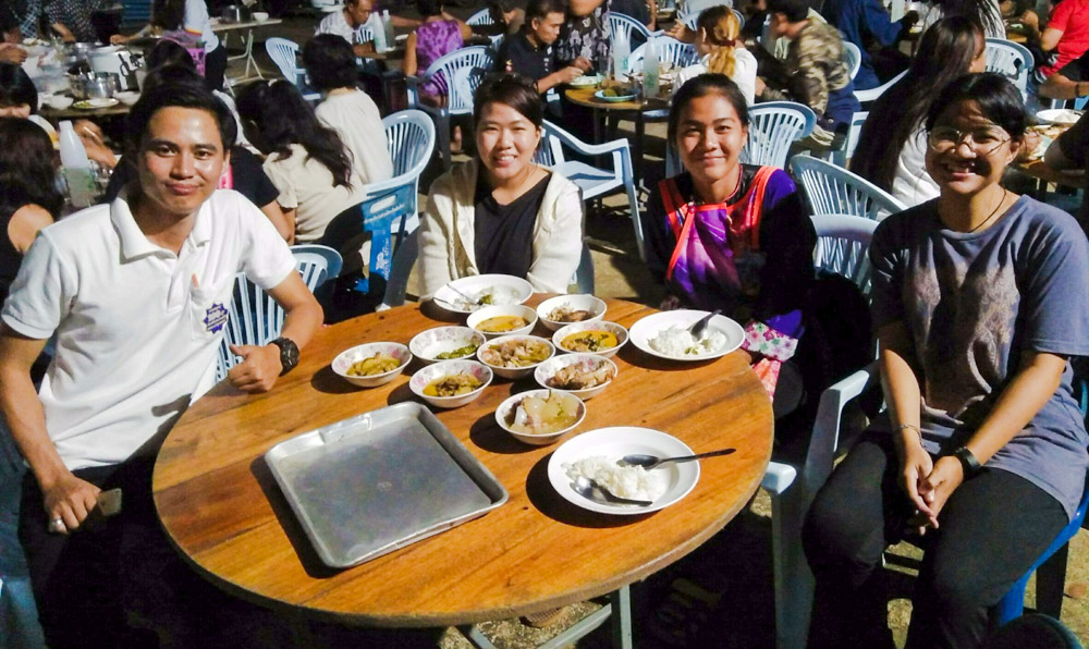 Community gathering in a public hall near Chiang Mai to celebrate the bicentenary