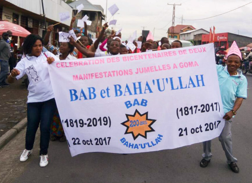 Youth hold a banner in the parade held in Goma, Democratic Republic of the Congo.