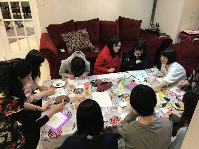 Youth in Akita, Japan, gather in a home to celebrate the bicentenary.