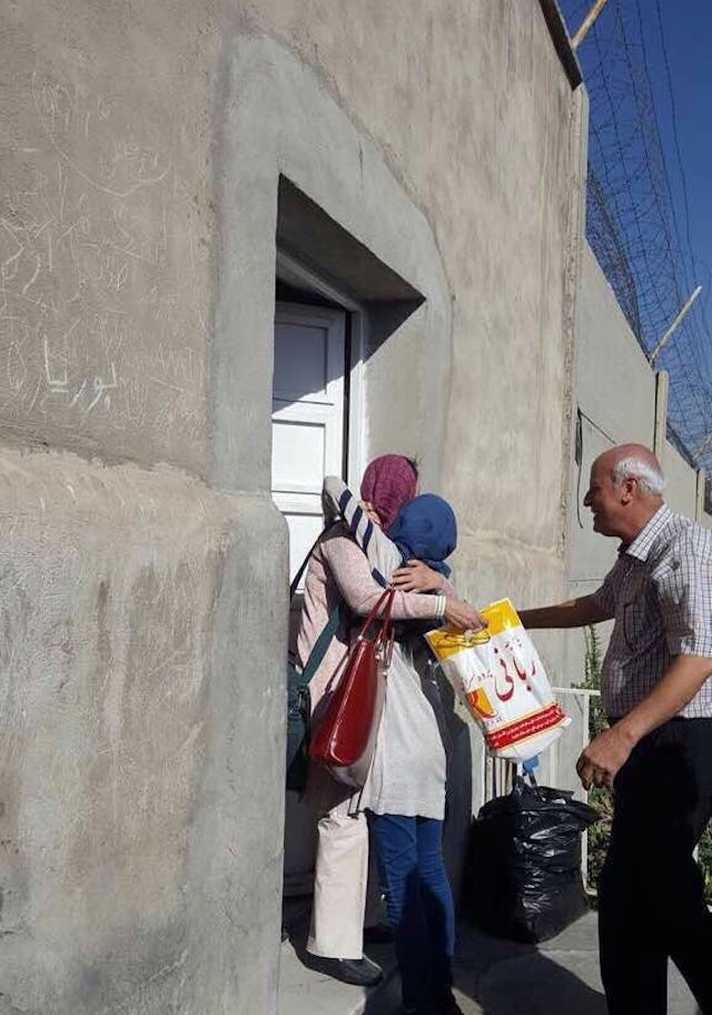 Fariba Kamalabadi leaving the prison where she was unjustly held for ten years. She is greeted by members of her family.