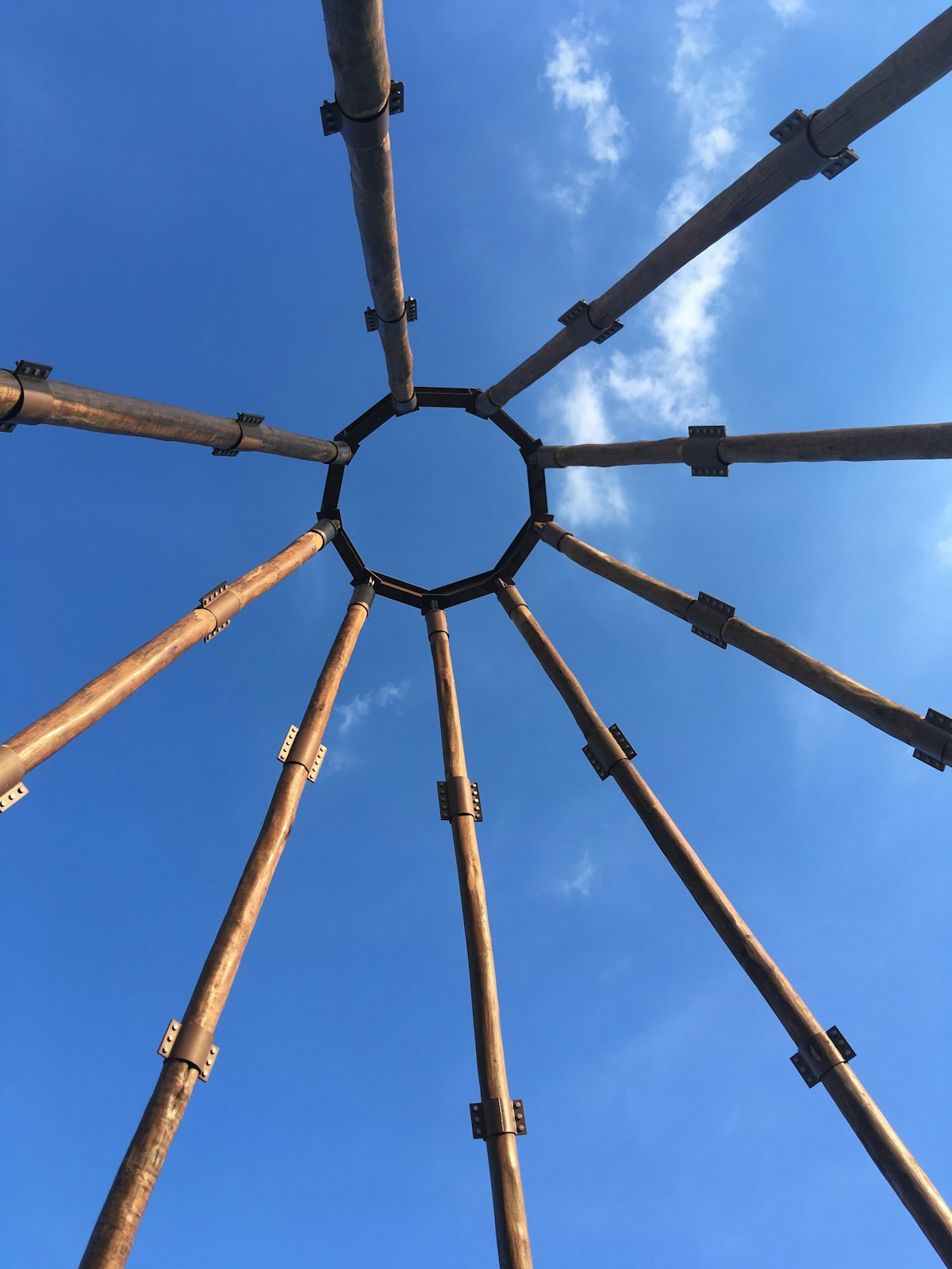The nine timber masts that form the inner dome of the House of Worship are crowned by a steel ring-beam which will encase the Greatest Name once the Temple is completed.
