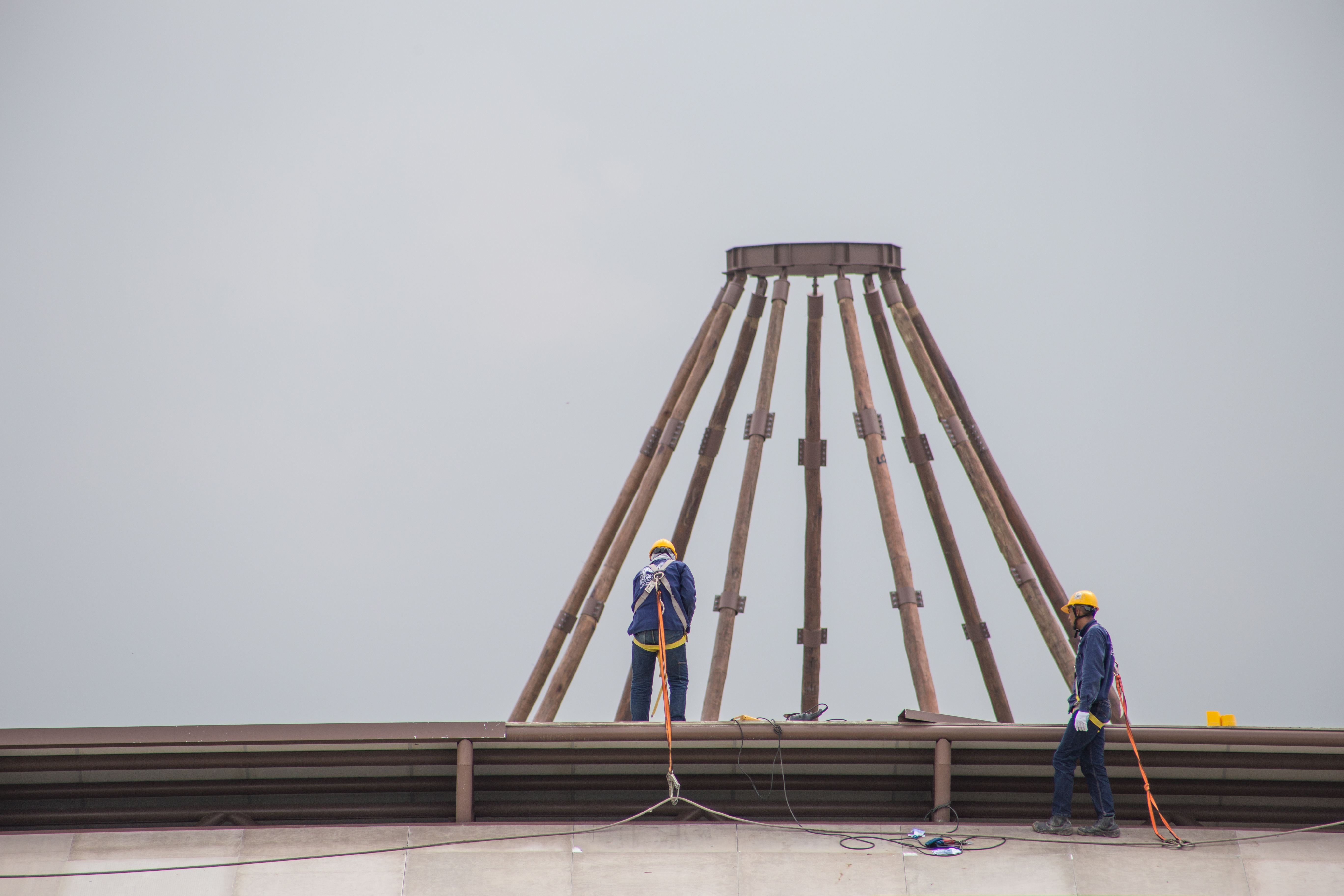 The nine timber masts that form the inner dome of the House of Worship are crowned by a steel ring-beam which will encase the Greatest Name once the Temple is completed.