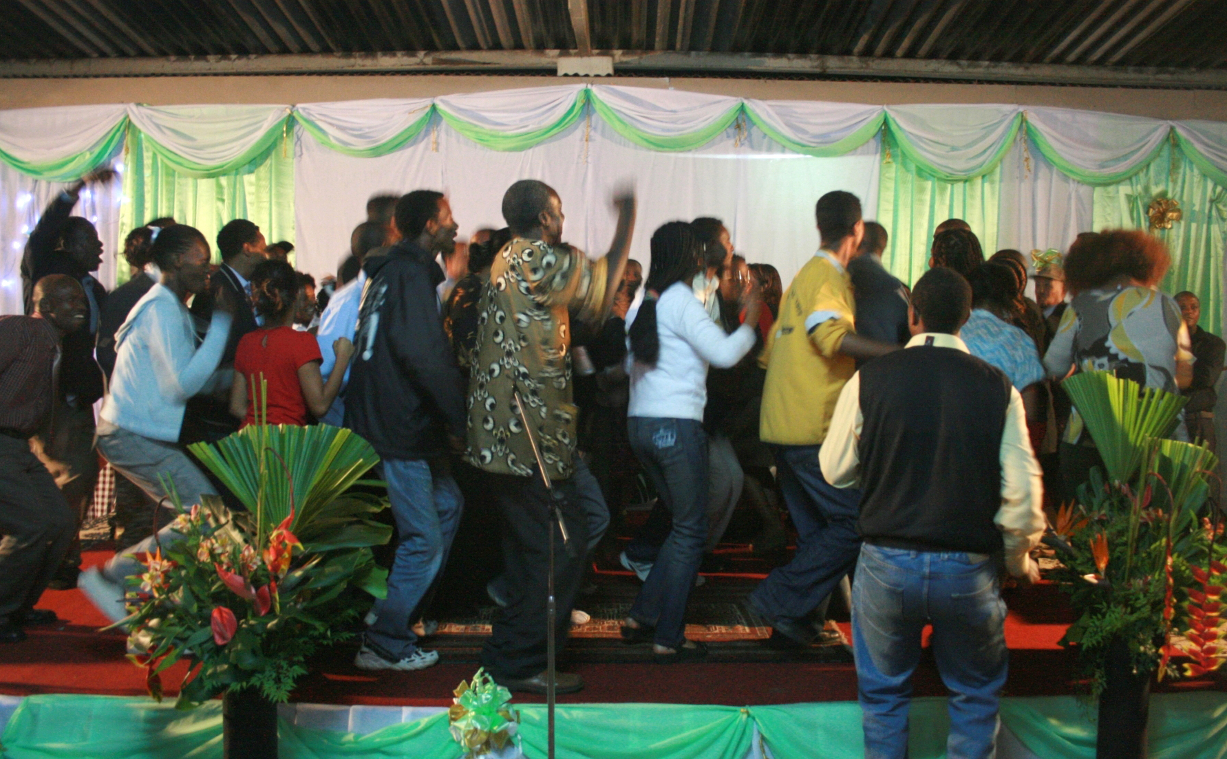 At the conference in Nakuru, friends from Ethiopia join together in a dance.