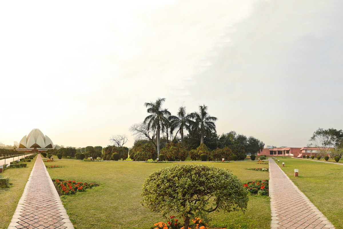 The Lotus Temple (left) and the new educational facility (right)