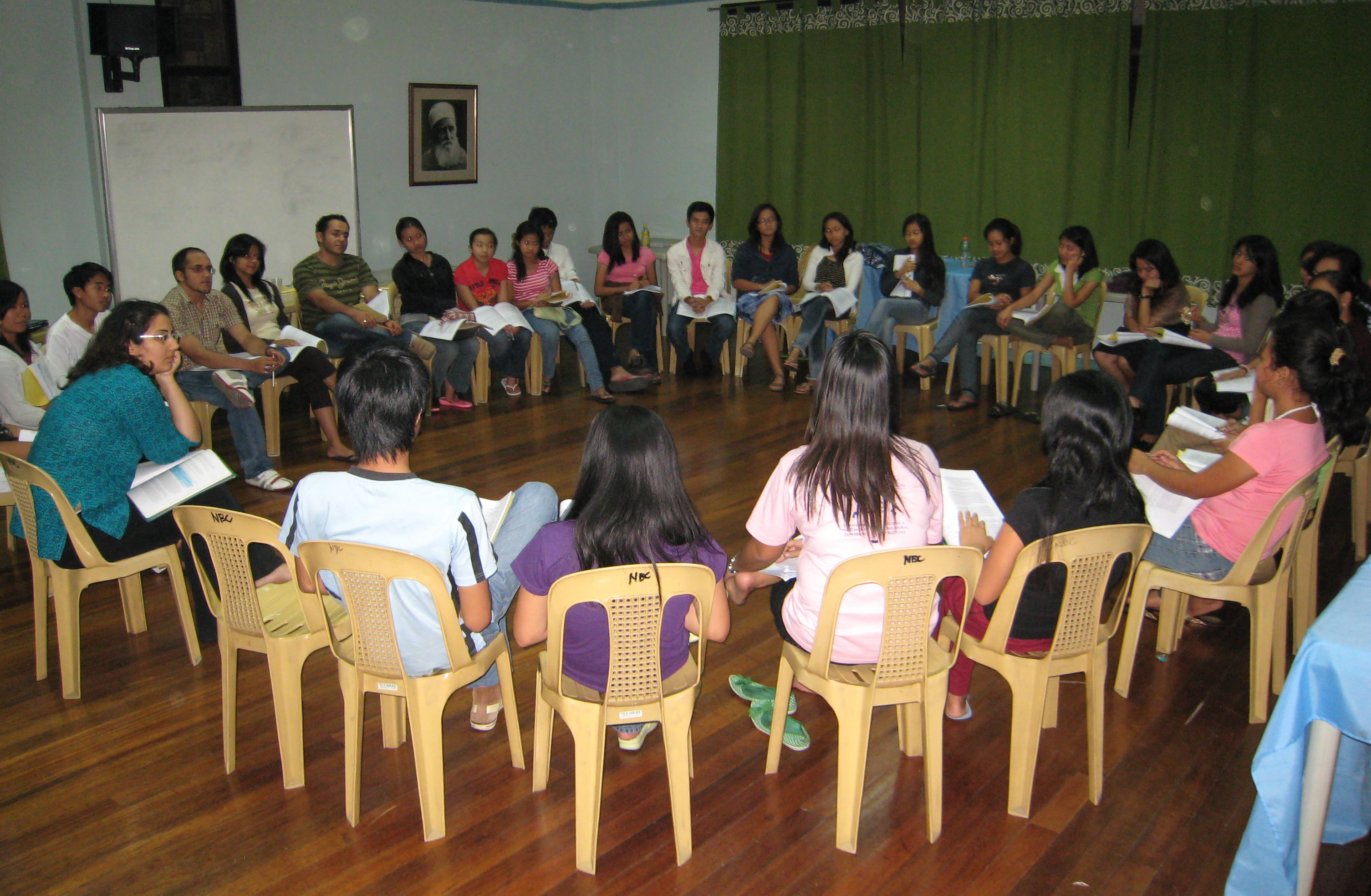 Students at the seminar in the Philippines gather to explore the elements of a discourse on social action. (Photograph by Anis Ragland)