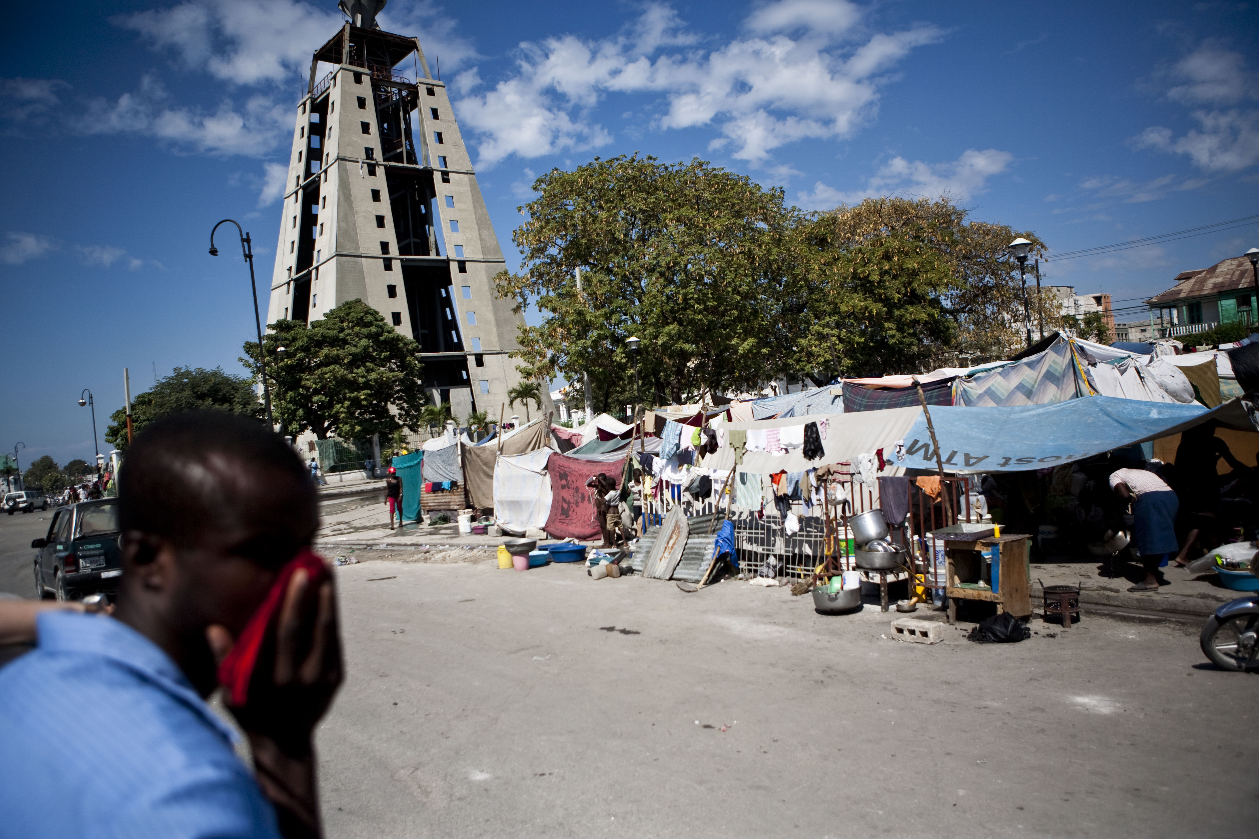 Near downtown Port-au-Prince, people have set up homemade tents to provide shelter. "They use poles and sticks and rags, and they make their own home," explained one of the doctors who visited recently on the medical mission.