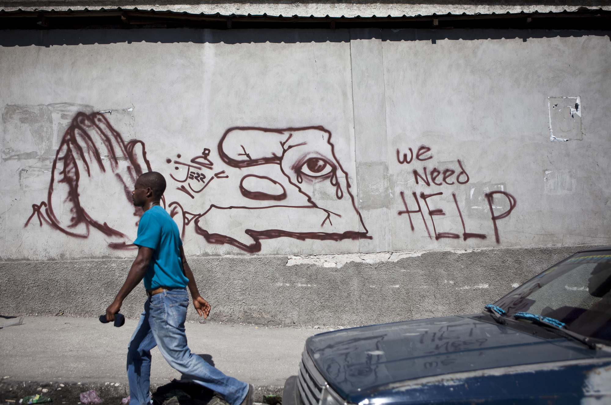 Some of the graffiti on the streets is written in English.