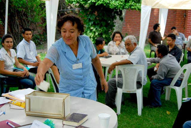 A delegate to this year’s national convention in El Salvador casts her vote for the National Spiritual Assembly. It was the 50th such Baha'i convention in that country, and special events were planned to mark the occasion. (Photos courtesy of the Baha'i Community of El Salvador)