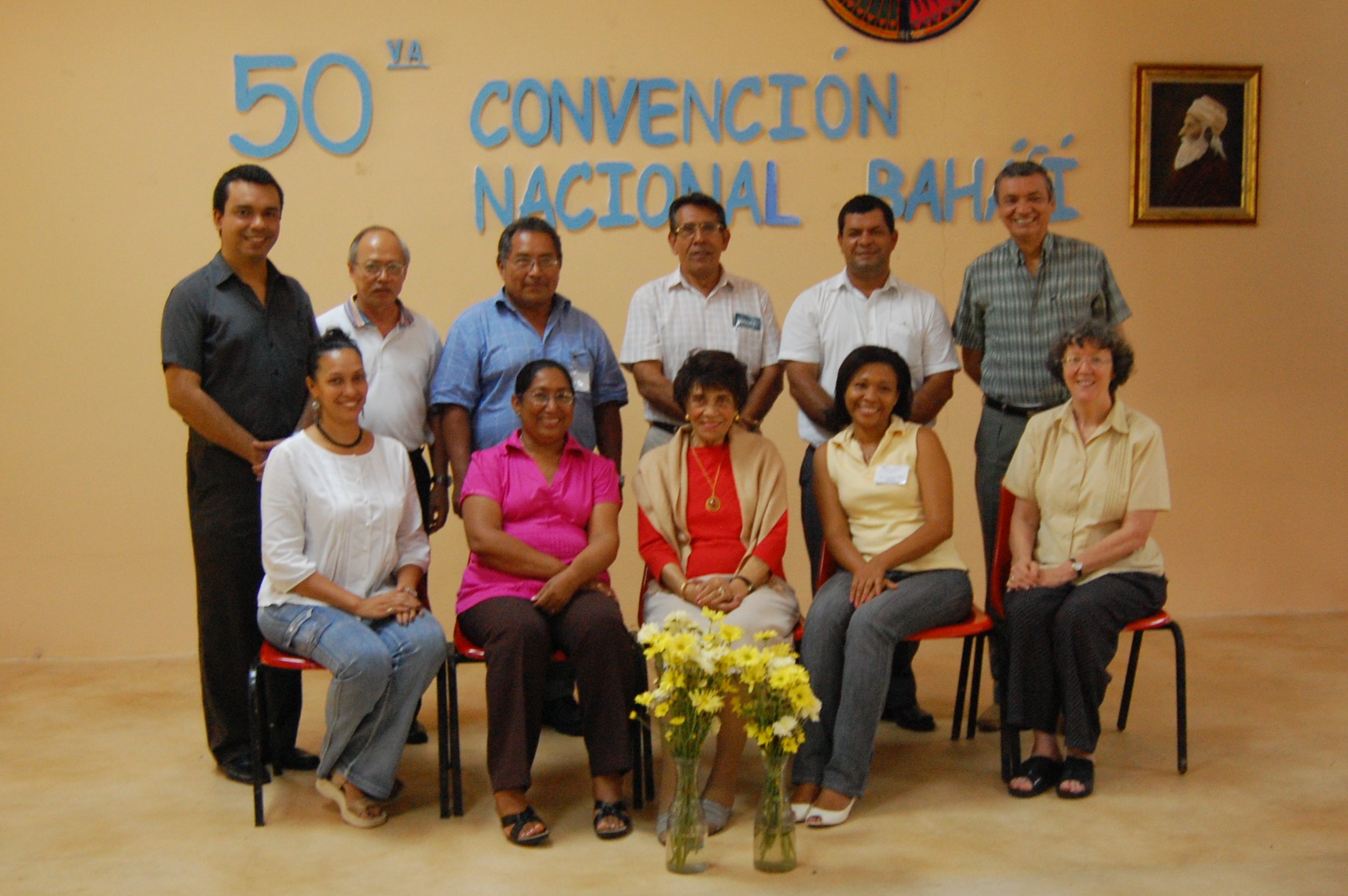 In Panama, Raquel Constante, center front, a member of the first National Spiritual Assembly elected in 1961, joins those elected this year for a photograph. Seated second from left is Carmen Elisa Sadeghian, a member of the Continental Board of Counselors who attended the convention. So far the only Baha'i House of Worship in Latin America is located in Panama, and a special devotional service was held there to celebrate the 50th national convention.
