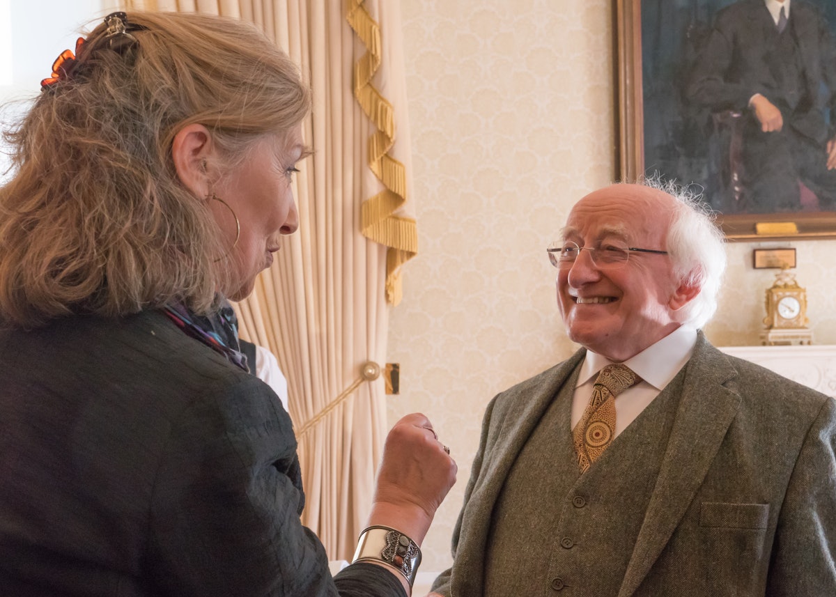 Irish President Michael Higgins greets members of the Baha’i community at the reception for the bicentenary.