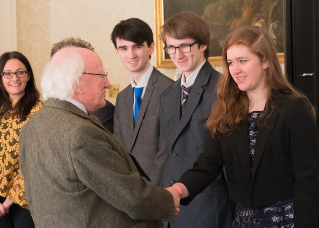 Irish President Michael Higgins greets members of the Baha’i community at the reception for the bicentenary.